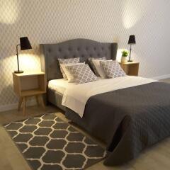 Апартаменты Blooms Inn & Apartments Познань комната для гостей фото 4