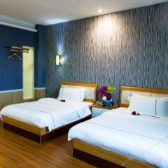 Yijia Holiday Hotel комната для гостей