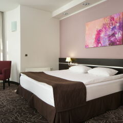 Гостиница AZIMUT Hotel FREESTYLE Rosa Khutor в Эсто-Садке - забронировать гостиницу AZIMUT Hotel FREESTYLE Rosa Khutor, цены и фото номеров Эсто-Садок комната для гостей фото 4