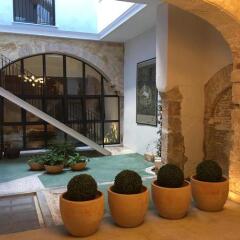 Отель Mon Suites San Nicolás бассейн фото 2