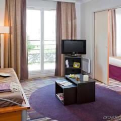 Отель Adagio Paris Buttes Chaumont Париж комната для гостей