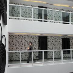 Отель Amari Nova Suites фитнесс-зал фото 4