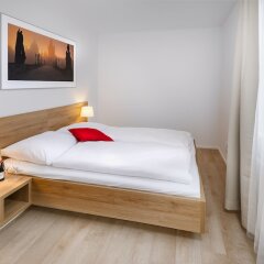 Апартаменты CityWest Apartments комната для гостей фото 2