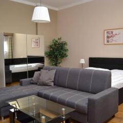 Апартаменты Melantrich Apartments комната для гостей