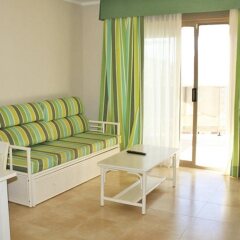 Отель Apartamentos Esmeralda Suites Испания, Кальпе - отзывы, цены и фото номеров - забронировать отель Apartamentos Esmeralda Suites онлайн комната для гостей фото 4