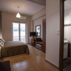 Отель Ambrosia Suites & Aparts комната для гостей фото 3