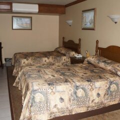 Отель El Dorado Inn сейф в номере