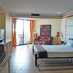 Апартаменты Paradise Condominium Apartments Паттайя комната для гостей фото 4