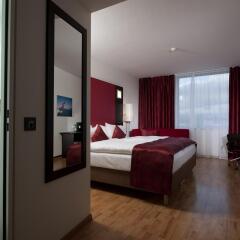 Отель Ramada Encore Geneva Швейцария, Ланси - 1 отзыв об отеле, цены и фото номеров - забронировать отель Ramada Encore Geneva онлайн комната для гостей фото 4