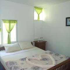 Отель Aquarius Inn Inle Lake Мьянма, Хехо - отзывы, цены и фото номеров - забронировать отель Aquarius Inn Inle Lake онлайн комната для гостей