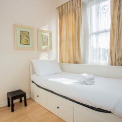Апартаменты Lovely 2 Bedroom Apartment Near Hyde Park Лондон комната для гостей фото 2