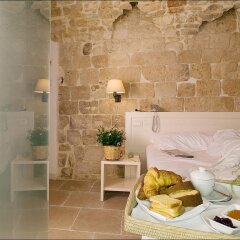 Отель Corte Altavilla Relais & Charme Конверсано в номере