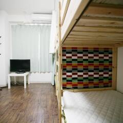 Отель Hikari House Токио комната для гостей