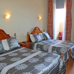 Отель Residencial Henrique VIII сейф в номере