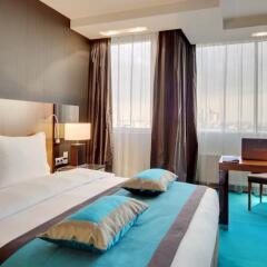 Гостиница Radisson Blu Belorusskaya в Москве - забронировать гостиницу Radisson Blu Belorusskaya, цены и фото номеров Москва комната для гостей фото 6