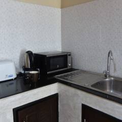 Апартаменты Baan Chai Lay Apartment Ланта в номере фото 2