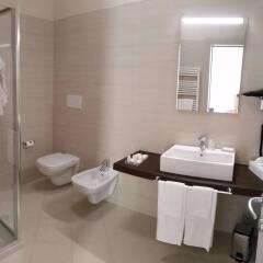 Clarion Collection Hotel Griso Мальграте ванная
