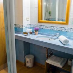 Отель Oriente Suites ванная