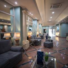 Отель 115 The Strand Suites интерьер отеля