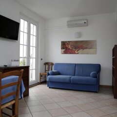 Отель Residence Antico Crotto Порлецца комната для гостей