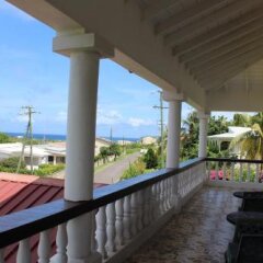 Fern Tree Bed And Breakfast in Basseterre, St. Kitts and Nevis from 140$, photos, reviews - zenhotels.com balcony