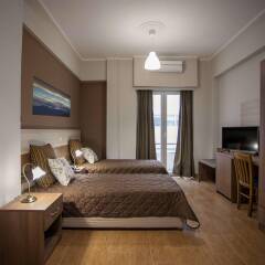 Отель Ambrosia Suites & Aparts комната для гостей фото 5