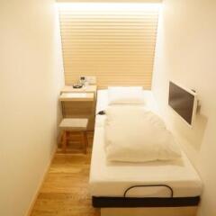 Отель Executive Spa & Capsule WELLBE Fukuoka - Caters to Men Хаката комната для гостей фото 3
