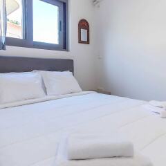 Отель Stylish 2 Bedroom Apartment Spectacular Sea View Греция, Вари-Вула-Вулиагмени - отзывы, цены и фото номеров - забронировать отель Stylish 2 Bedroom Apartment Spectacular Sea View онлайн комната для гостей фото 2