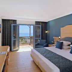 Отель Aegean Village Hotel Греция, Мастичари - отзывы, цены и фото номеров - забронировать отель Aegean Village Hotel онлайн комната для гостей