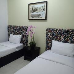 Отель Ar-Raudhah Suites and Hotel Малайзия, Пенанг - отзывы, цены и фото номеров - забронировать отель Ar-Raudhah Suites and Hotel онлайн комната для гостей фото 2