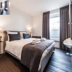 Апартаменты East Quarter Apartments комната для гостей