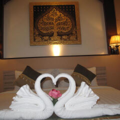 Отель QG Resort в номере