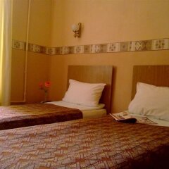 Гостиница Central Inn - Атмосфера в Санкт-Петербурге - забронировать гостиницу Central Inn - Атмосфера, цены и фото номеров Санкт-Петербург комната для гостей фото 2