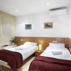 Отель Apartamentos Calvet Испания, Барселона - отзывы, цены и фото номеров - забронировать отель Apartamentos Calvet онлайн комната для гостей фото 4