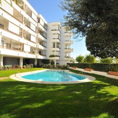 Отель HomeHolidaysRentals Apartamento Canet Playa l - Costa Barcelona бассейн фото 3