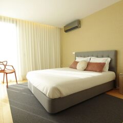 Апартаменты Deluxe Populo Beach Apartments комната для гостей фото 5