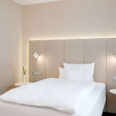 Отель NH Collection Frankfurt City комната для гостей фото 3