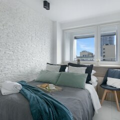 Отель P&O Apartments Zgoda Польша, Варшава - отзывы, цены и фото номеров - забронировать отель P&O Apartments Zgoda онлайн комната для гостей