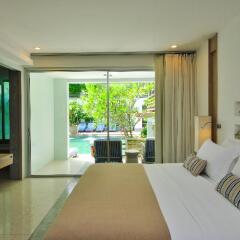 Отель Ramada by Wyndham Phuket Southsea 4* Стандартный номер разные типы кроватей фото 9
