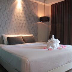 Отель Inn Place Serviced Residence Паттайя комната для гостей фото 5