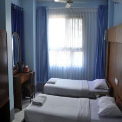 Garden Hotel комната для гостей фото 3
