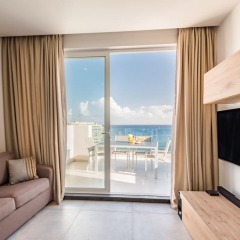 Отель Saint Julian's - Spinola Bay Apartment Мальта, Сан Джулианс - отзывы, цены и фото номеров - забронировать отель Saint Julian's - Spinola Bay Apartment онлайн комната для гостей