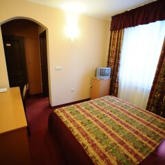 Elegance Hotel комната для гостей