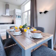 Апартаменты Tropen Apartments в номере