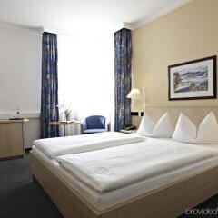 Отель IntercityHotel Rostock комната для гостей фото 3