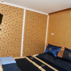Апартаменты Jomtien Good Luck Apartment Паттайя комната для гостей