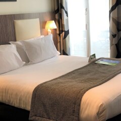 Отель Holiday Inn Paris Opera - Grands Boulevards Париж комната для гостей