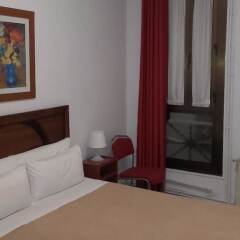 Отель Hostal Absolut Stay Барселона комната для гостей фото 6