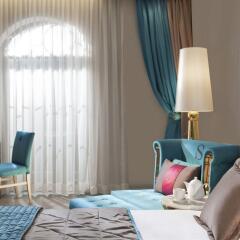 Sura Design Hotel and Suites - Boutique Class комната для гостей фото 5