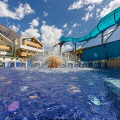 Отель Familien-Wellness Residence Tyrol Натурно бассейн